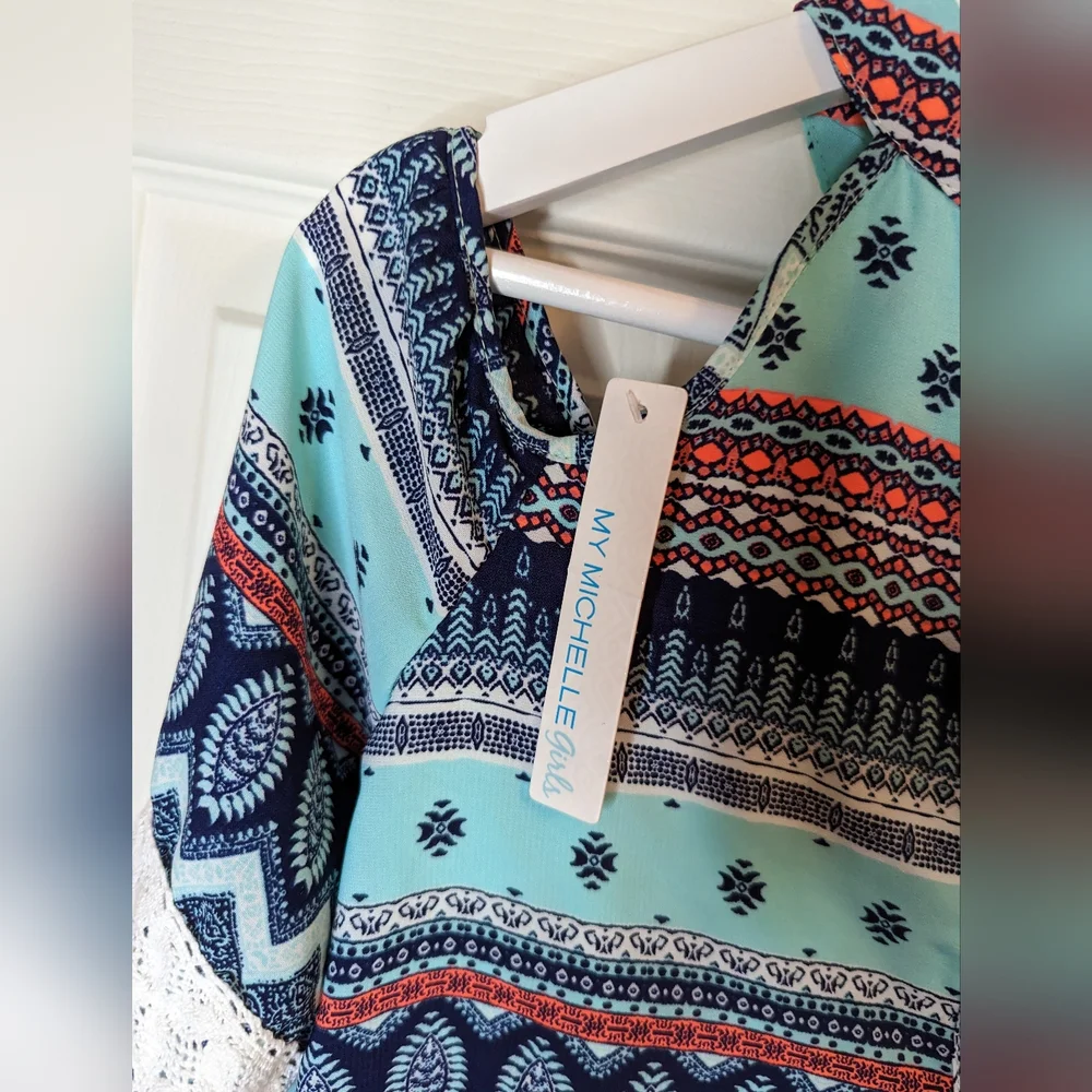 My Michelle girls blue multicolor romper open shoulders size large NWT